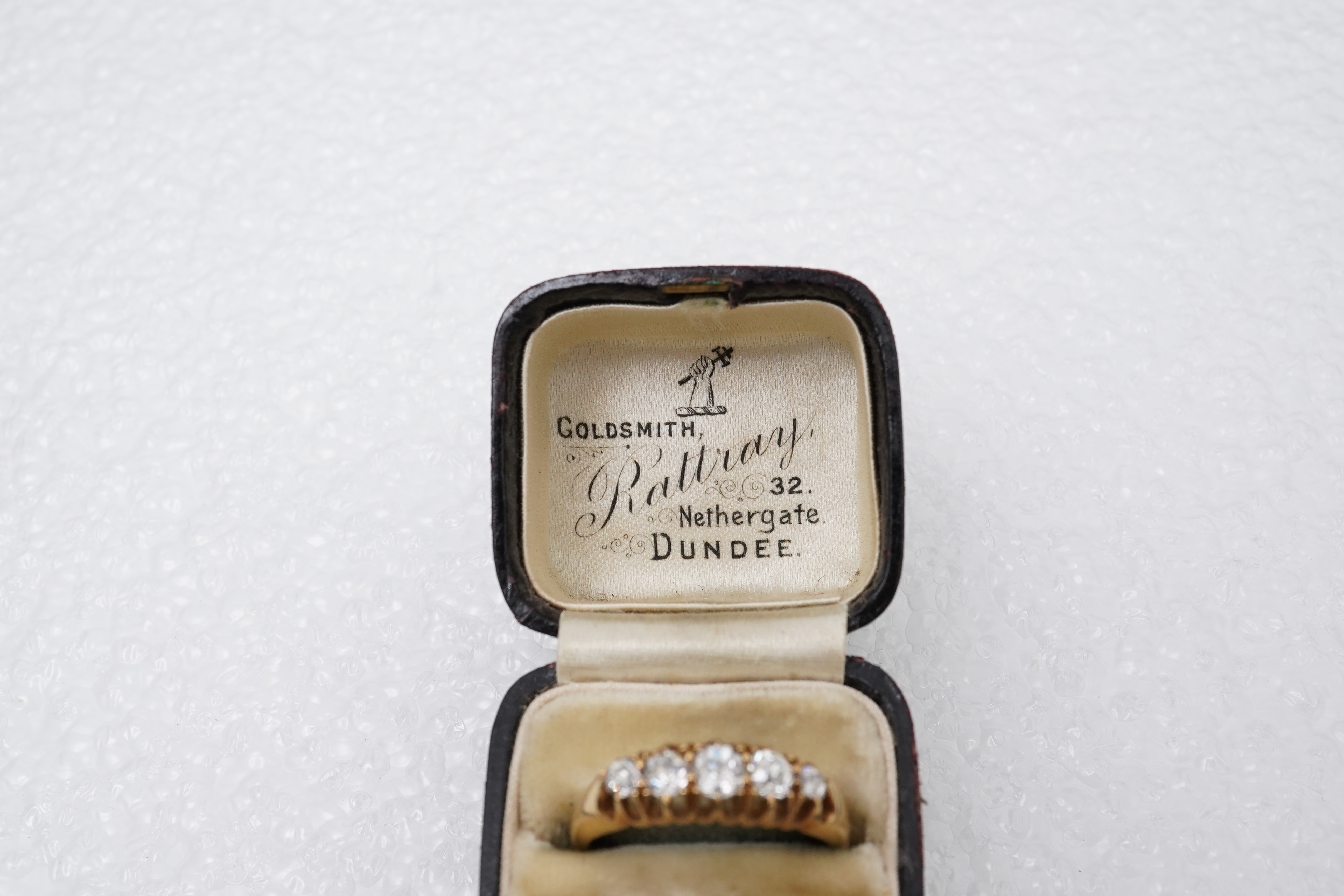 An Edwardian five-stone diamond ring, circa 1903